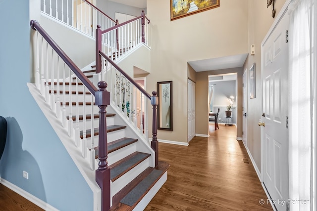 534 Ivory Ln, Bartlett, IL 60103 - foyer entrance featuring wood finished floors, stairs, and a towering ceiling