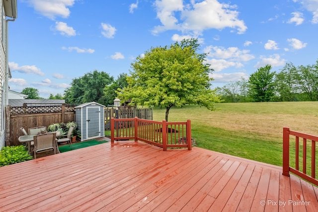 534 Ivory Ln, Bartlett, IL 60103 - wooden terrace featuring a storage shed and outdoor dining area