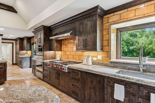 1899 Hilltop Ln, Bannockburn, IL 60015 - kitchen featuring range hood, stainless steel gas stovetop, backsplash, dark brown cabinetry, and a warming drawer
