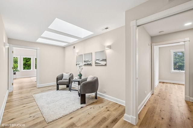 1899 Hilltop Ln, Bannockburn, IL 60015 - living area with a skylight and wood finished floors