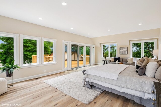 1899 Hilltop Ln, Bannockburn, IL 60015 - bedroom with access to exterior, light wood-type flooring, and recessed lighting
