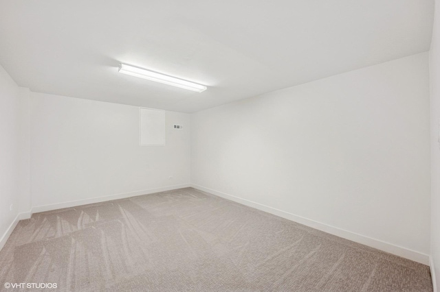 1899 Hilltop Ln, Bannockburn, IL 60015 - empty room featuring light carpet and baseboards