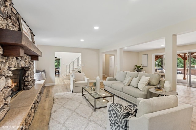 1899 Hilltop Ln, Bannockburn, IL 60015 - living area with light wood-type flooring, recessed lighting, stairway, and a fireplace