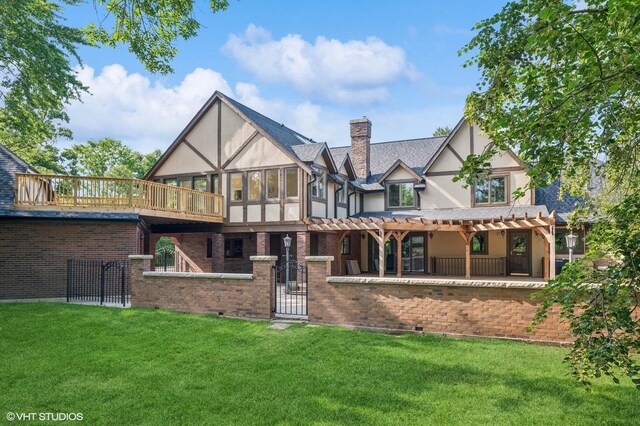1899 Hilltop Ln, Bannockburn, IL 60015 - back of house featuring a gate, stucco siding, a chimney, and brick siding