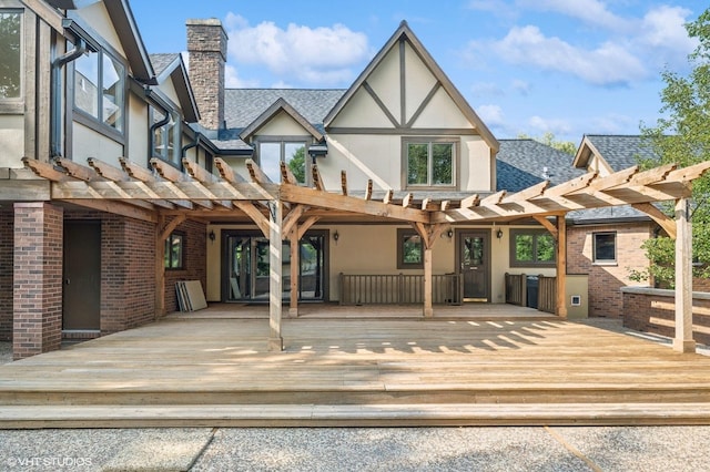 1899 Hilltop Ln, Bannockburn, IL 60015 - rear view of property with a chimney, stucco siding, and a pergola