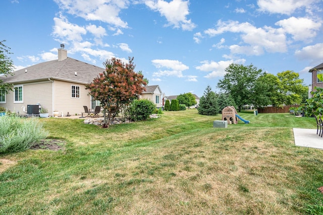 15710 S Cove Cir, Plainfield, IL 60544 - view of green lawn with a patio and a playground