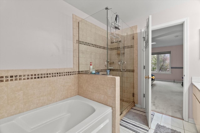 11257 Melrose Ct, Orland Park, IL 60467 - bathroom featuring a bath, a shower stall, tile patterned floors, and vanity