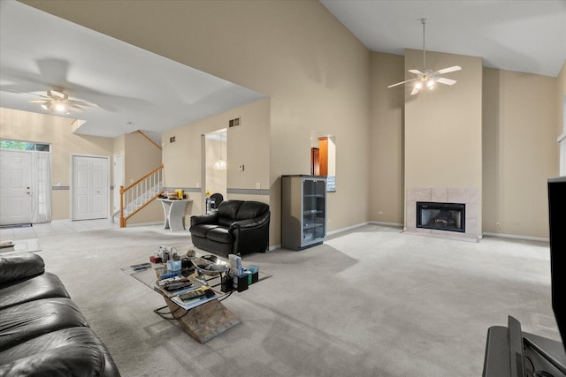 11257 Melrose Ct, Orland Park, IL 60467 - living area with a ceiling fan, stairs, carpet floors, and high vaulted ceiling