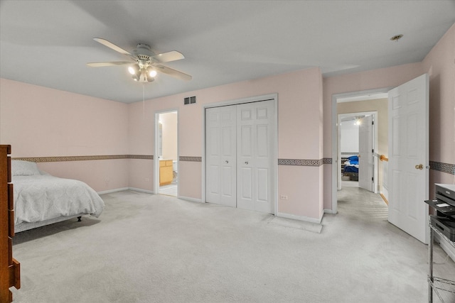 11257 Melrose Ct, Orland Park, IL 60467 - bedroom featuring light carpet, a closet, a ceiling fan, and ensuite bath