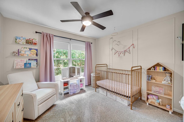 826 N Auburn Woods Dr, Palatine, IL 60067 - bedroom featuring a nursery area, carpet, and a ceiling fan