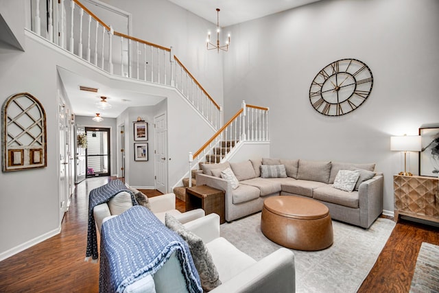 826 N Auburn Woods Dr, Palatine, IL 60067 - living room with a chandelier, wood finished floors, stairway, and a high ceiling