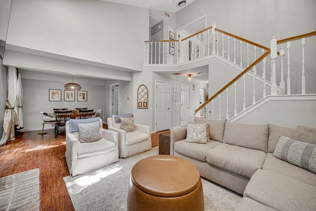 826 N Auburn Woods Dr, Palatine, IL 60067 - living room with a high ceiling, wood finished floors, and stairway