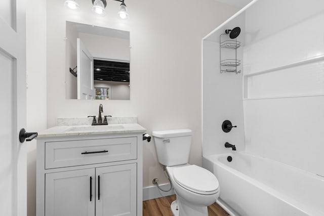 6427 Harlem Rd, Loves Park, IL 61111 - full bath with wood finished floors, vanity, and shower / tub combination