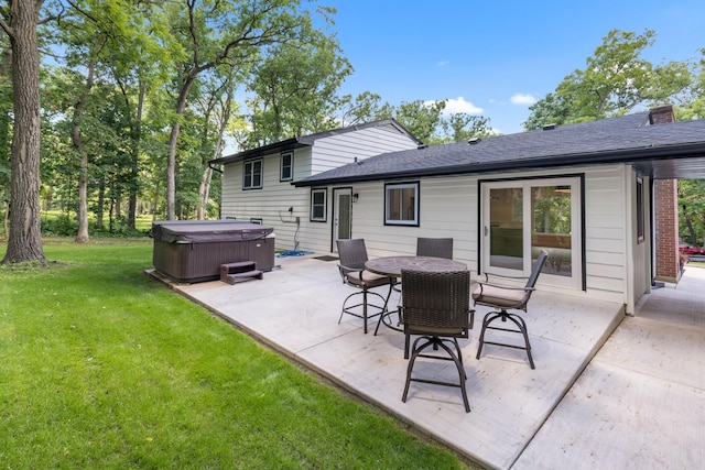 6427 Harlem Rd, Loves Park, IL 61111 - view of patio / terrace featuring a hot tub