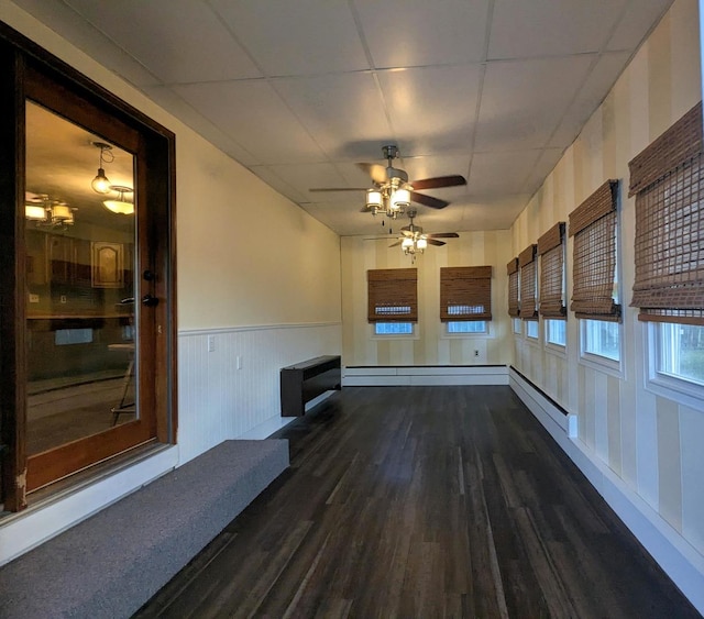 108 Janet Ave, Rochelle, IL 61068 - unfurnished sunroom with a baseboard heating unit