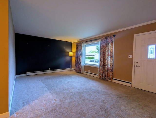 108 Janet Ave, Rochelle, IL 61068 - carpeted empty room with healthy amount of natural light, baseboard heating, and ornamental molding
