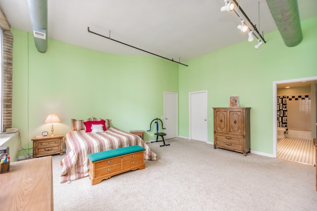 1020 S Wabash Ave Unit 7C, Chicago, IL 60605 - bedroom with carpet flooring, a high ceiling, and rail lighting