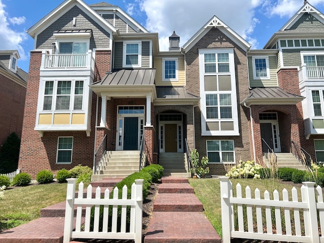 4182 Royal Mews Cir, Naperville, IL 60564 - view of front of property featuring brick siding, a standing seam roof, entry steps, and a metal roof