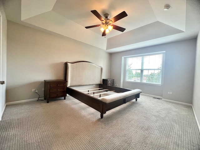 4182 Royal Mews Cir, Naperville, IL 60564 - bedroom with a raised ceiling, light carpet, and ceiling fan