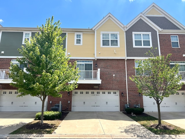 4182 Royal Mews Cir, Naperville, IL 60564 - multi unit property featuring brick siding, a garage, and driveway