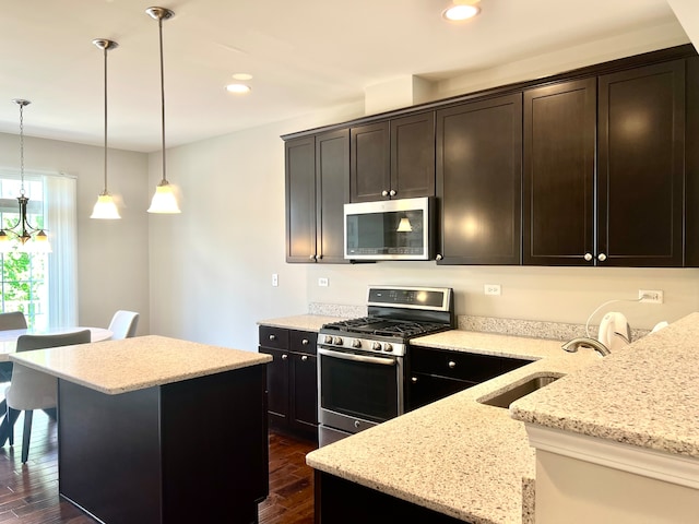 4182 Royal Mews Cir, Naperville, IL 60564 - kitchen with appliances with stainless steel finishes, dark wood-type flooring, light stone counters, a kitchen breakfast bar, and recessed lighting