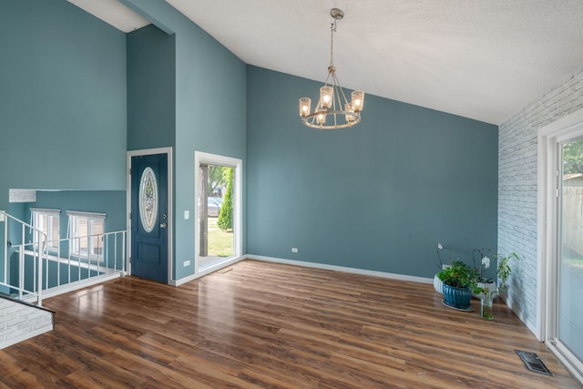 2S464 Cottonwood Ct, Warrenville, IL 60555 - entryway with a chandelier, wood finished floors, and high vaulted ceiling