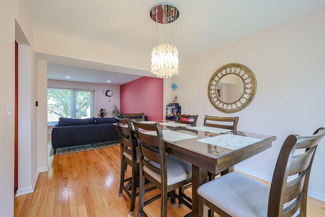 711 W Nichols Rd, Arlington Heights, IL 60004 - dining room featuring a chandelier, light wood-style floors, and recessed lighting