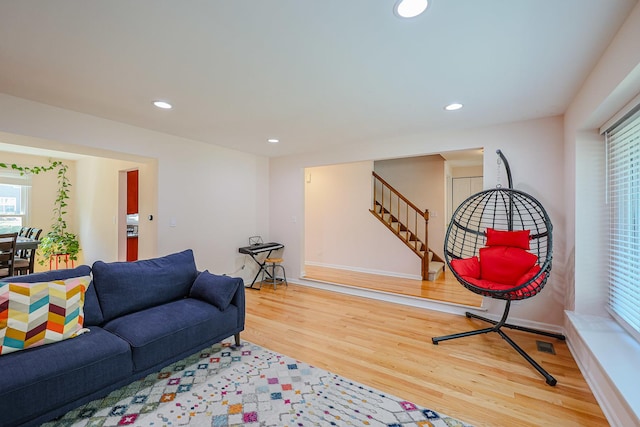 711 W Nichols Rd, Arlington Heights, IL 60004 - living room featuring wood finished floors, stairway, and recessed lighting