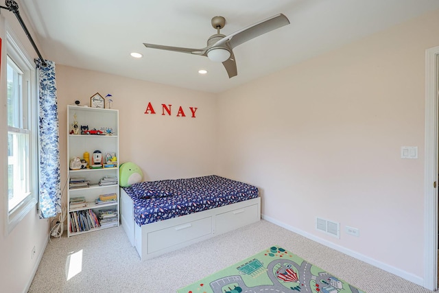 711 W Nichols Rd, Arlington Heights, IL 60004 - carpeted bedroom with multiple windows, recessed lighting, and a ceiling fan