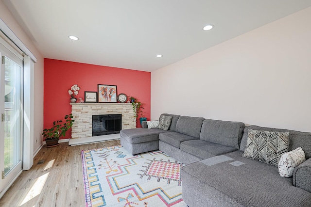 711 W Nichols Rd, Arlington Heights, IL 60004 - living room featuring plenty of natural light, wood finished floors, recessed lighting, and a fireplace