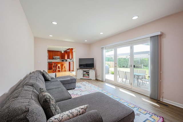 711 W Nichols Rd, Arlington Heights, IL 60004 - living room featuring light wood finished floors and recessed lighting
