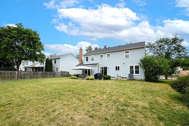711 W Nichols Rd, Arlington Heights, IL 60004 - rear view of house with a chimney and a gazebo