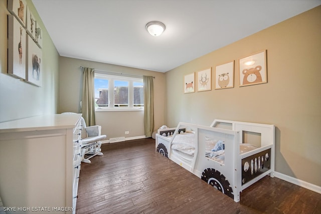 353 Eagle Ln, Bloomingdale, IL 60108 - bedroom featuring wood finished floors and a crib