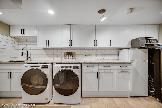 353 Eagle Ln, Bloomingdale, IL 60108 - washroom with independent washer and dryer and light wood-style floors