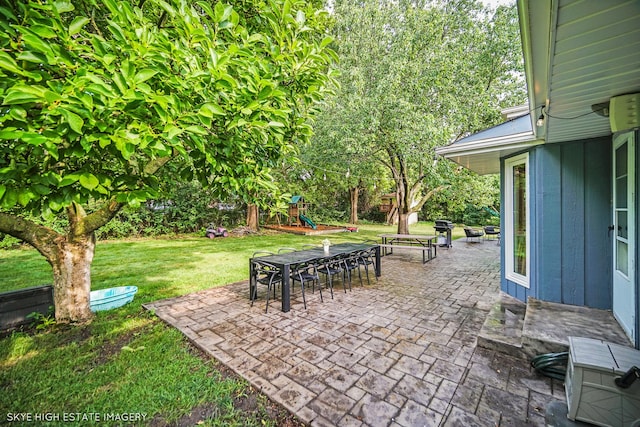 353 Eagle Ln, Bloomingdale, IL 60108 - view of patio / terrace featuring a playground and outdoor dining area