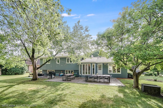 353 Eagle Ln, Bloomingdale, IL 60108 - back of property featuring a patio area and a lawn