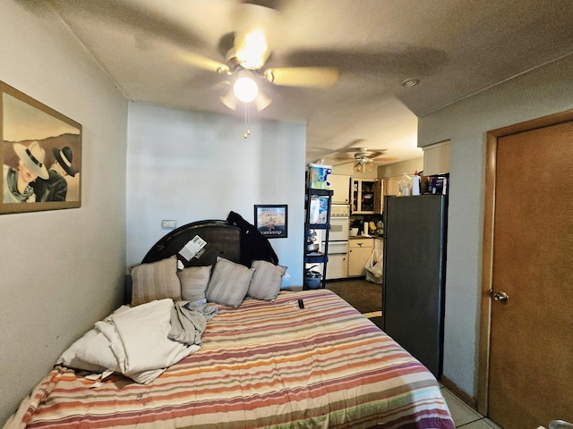 35 King Arthur Ct Unit 19, Northlake, IL 60164 - bedroom with freestanding refrigerator and a ceiling fan