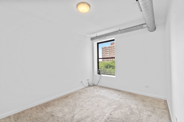 4537 S Drexel Blvd Unit 504, Chicago, IL 60653 - carpeted spare room with baseboards