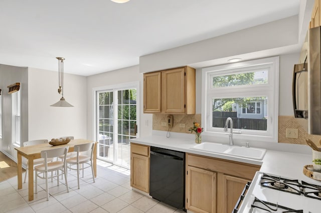 1439 Blue Heron Dr, Crystal Lake, IL 60014 - kitchen featuring dishwasher, light countertops, backsplash, and pendant lighting