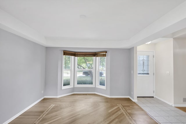 1439 Blue Heron Dr, Crystal Lake, IL 60014 - unfurnished room featuring wood finished floors and baseboards