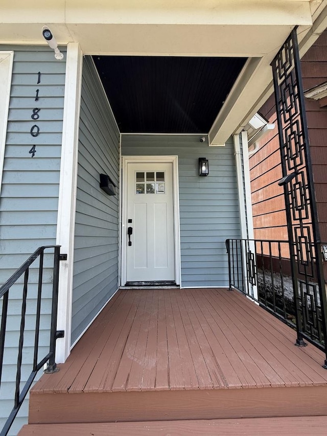 11804 S State St, Chicago, IL 60628 - doorway to property featuring a porch