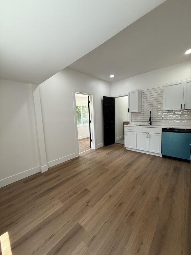 11804 S State St, Chicago, IL 60628 - unfurnished living room with recessed lighting and light wood-style flooring