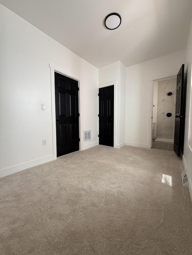 11804 S State St, Chicago, IL 60628 - unfurnished bedroom with carpet floors and baseboards