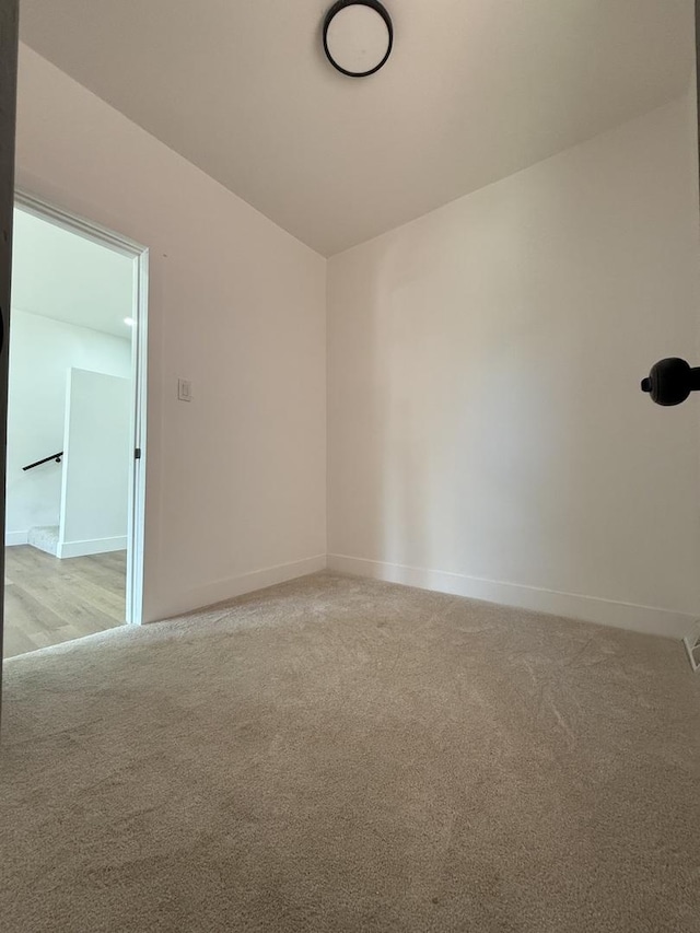 11804 S State St, Chicago, IL 60628 - empty room with light carpet and baseboards