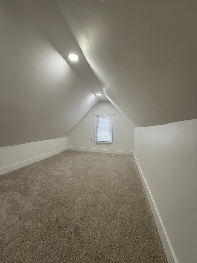11804 S State St, Chicago, IL 60628 - additional living space with vaulted ceiling, carpet flooring, and recessed lighting