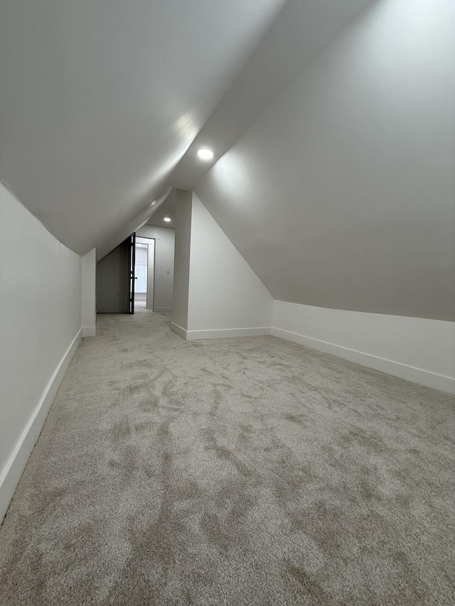 11804 S State St, Chicago, IL 60628 - bonus room with lofted ceiling, light colored carpet, and recessed lighting