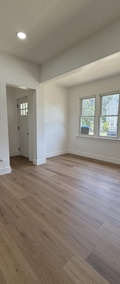 11804 S State St, Chicago, IL 60628 - empty room featuring wood finished floors and recessed lighting
