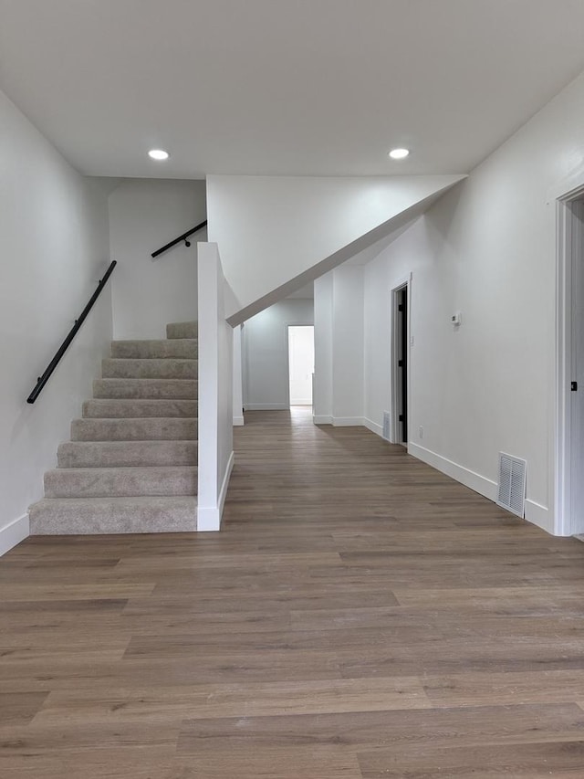 11804 S State St, Chicago, IL 60628 - stairs featuring recessed lighting and wood finished floors