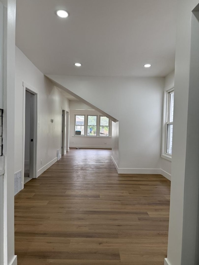 11804 S State St, Chicago, IL 60628 - empty room with wood finished floors and recessed lighting