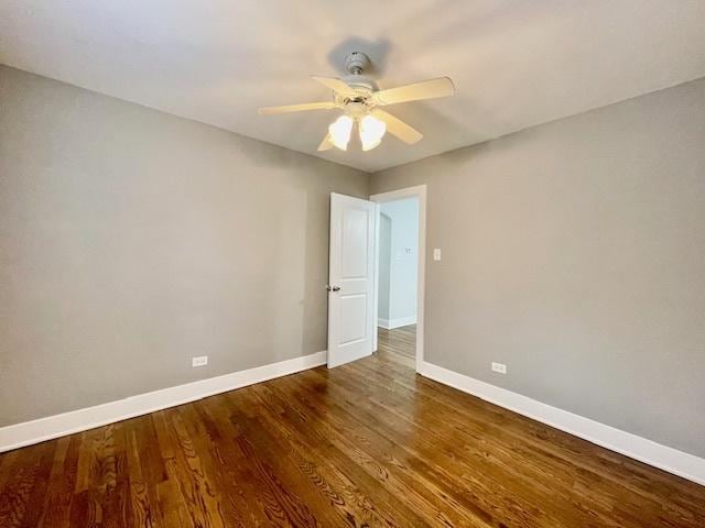 132 W 126th Pl, Chicago, IL 60628 - spare room with ceiling fan and wood finished floors